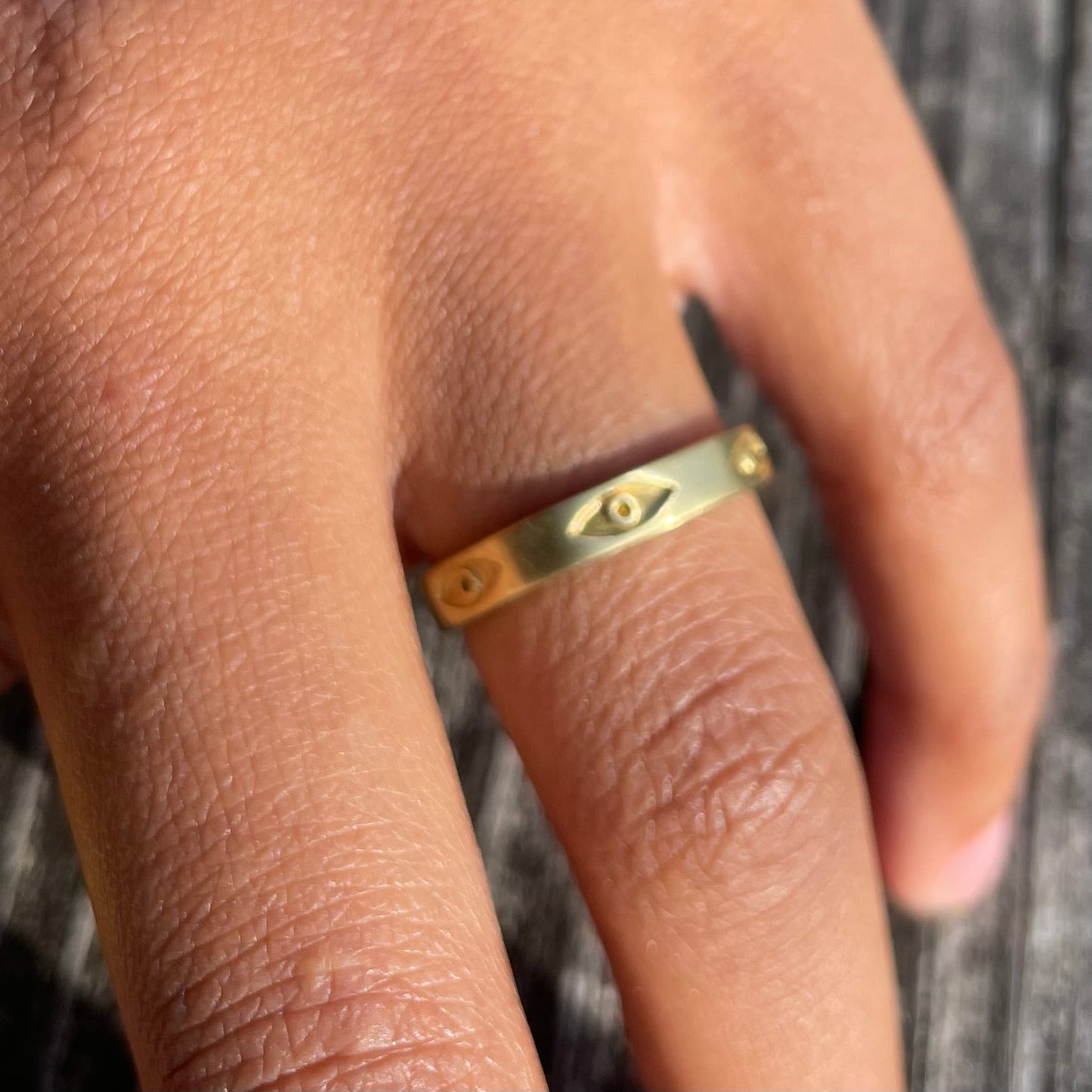 Evil eye band brass ring