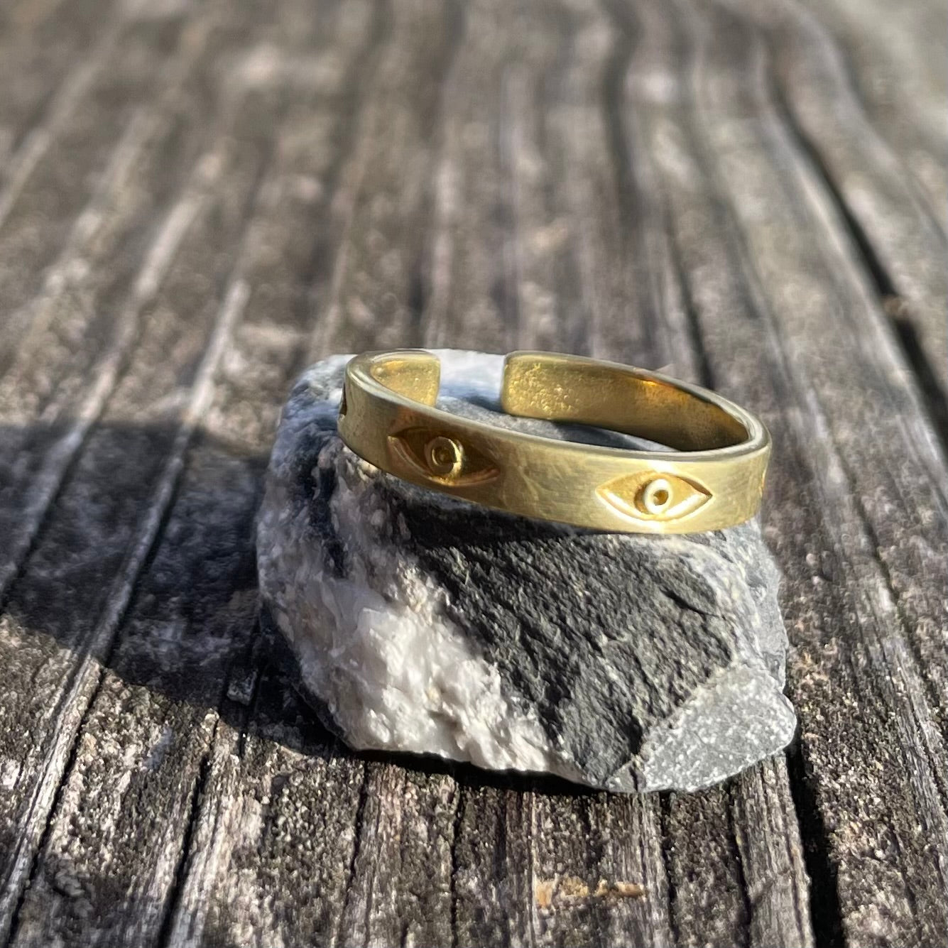 Evil eye band brass ring