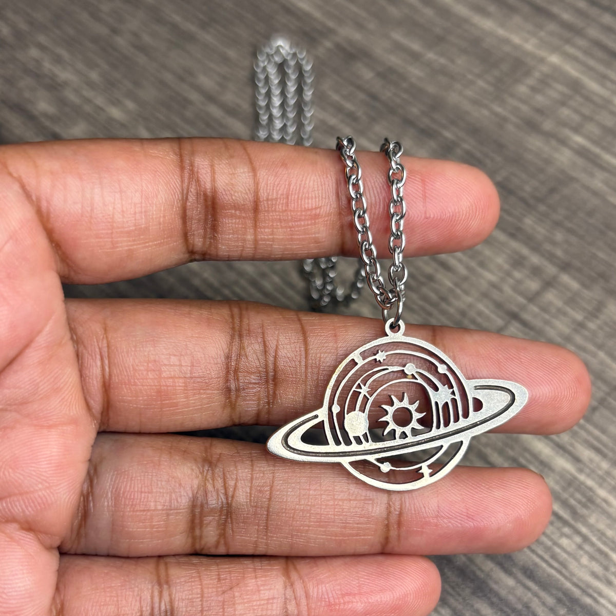 Saturn silver necklace