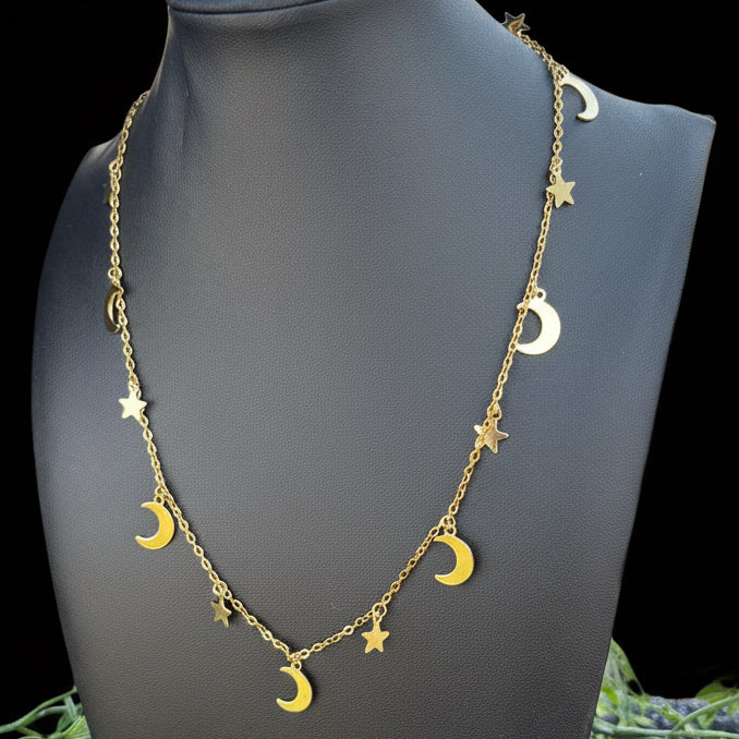 Gold stars and moons necklace